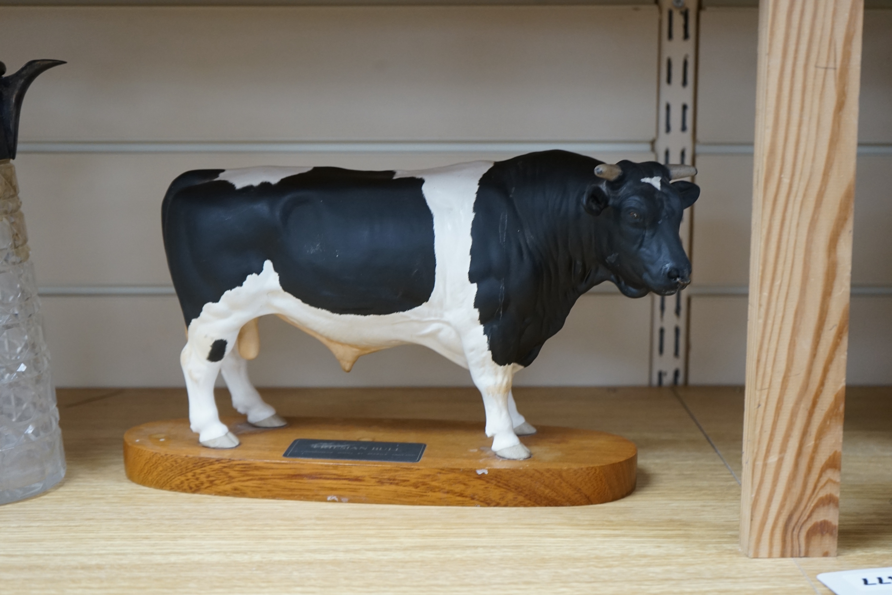 A Beswick ‘Fresian bull’, 29cm wide. Conditon - good